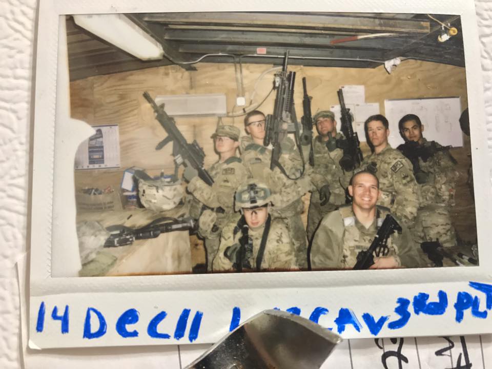 Dave Bayles with fellow soldiers during military deployment