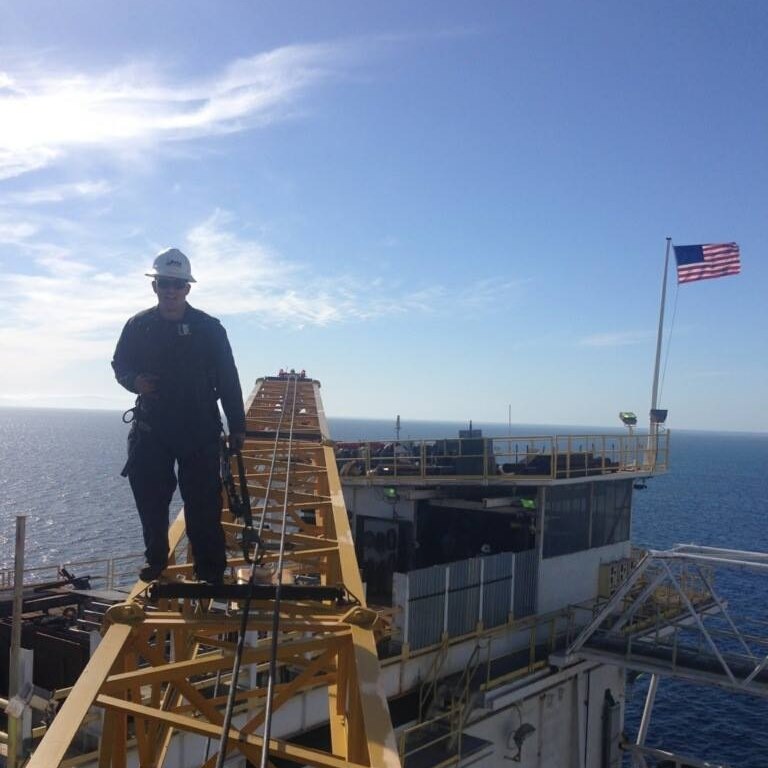 Dave Bayles working offshore in an industrial oil and gas environment