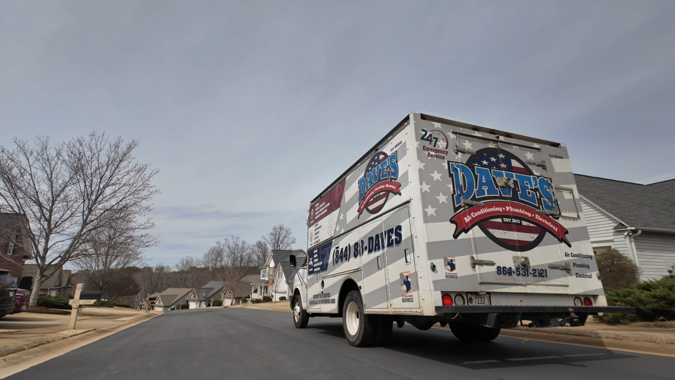 Dave’s Air Conditioning Plumbing and Electrical service van driving in Upstate South Carolina