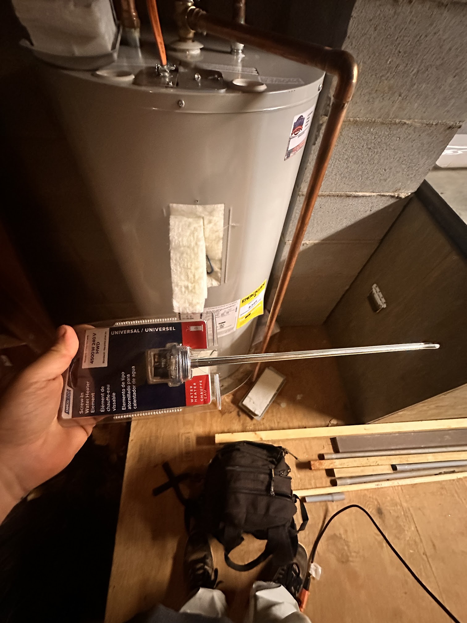 Electric water heater element repair by Dave's plumbing and electrical team