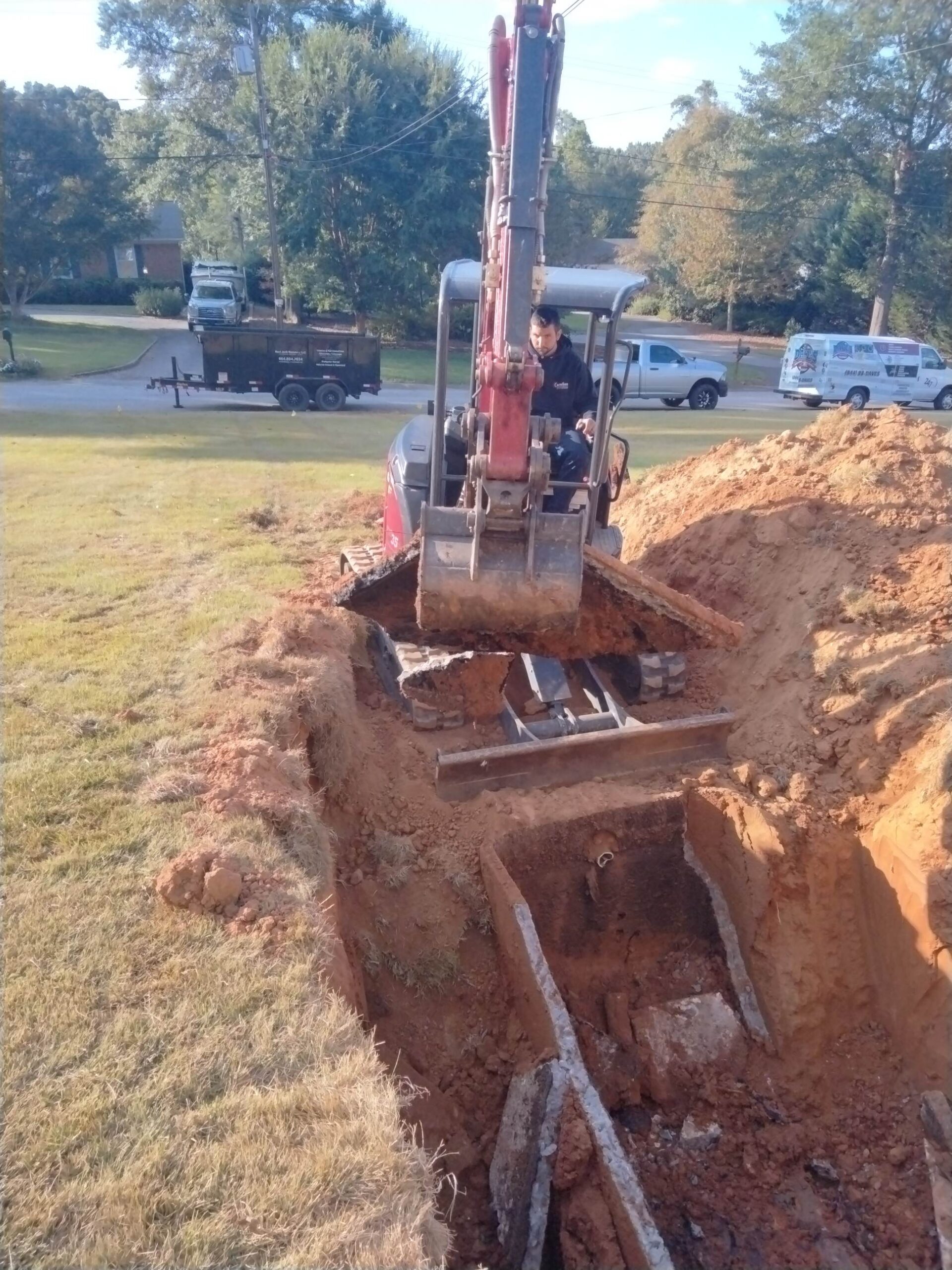 Dave's plumbing crew performing sewer and drain repair work in the Upstate